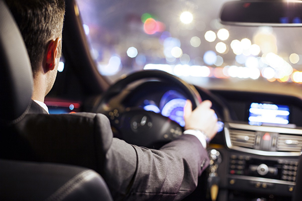 Guy driving a car